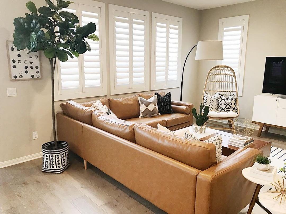 Comfortable living room with Polywood shutters in Destin.